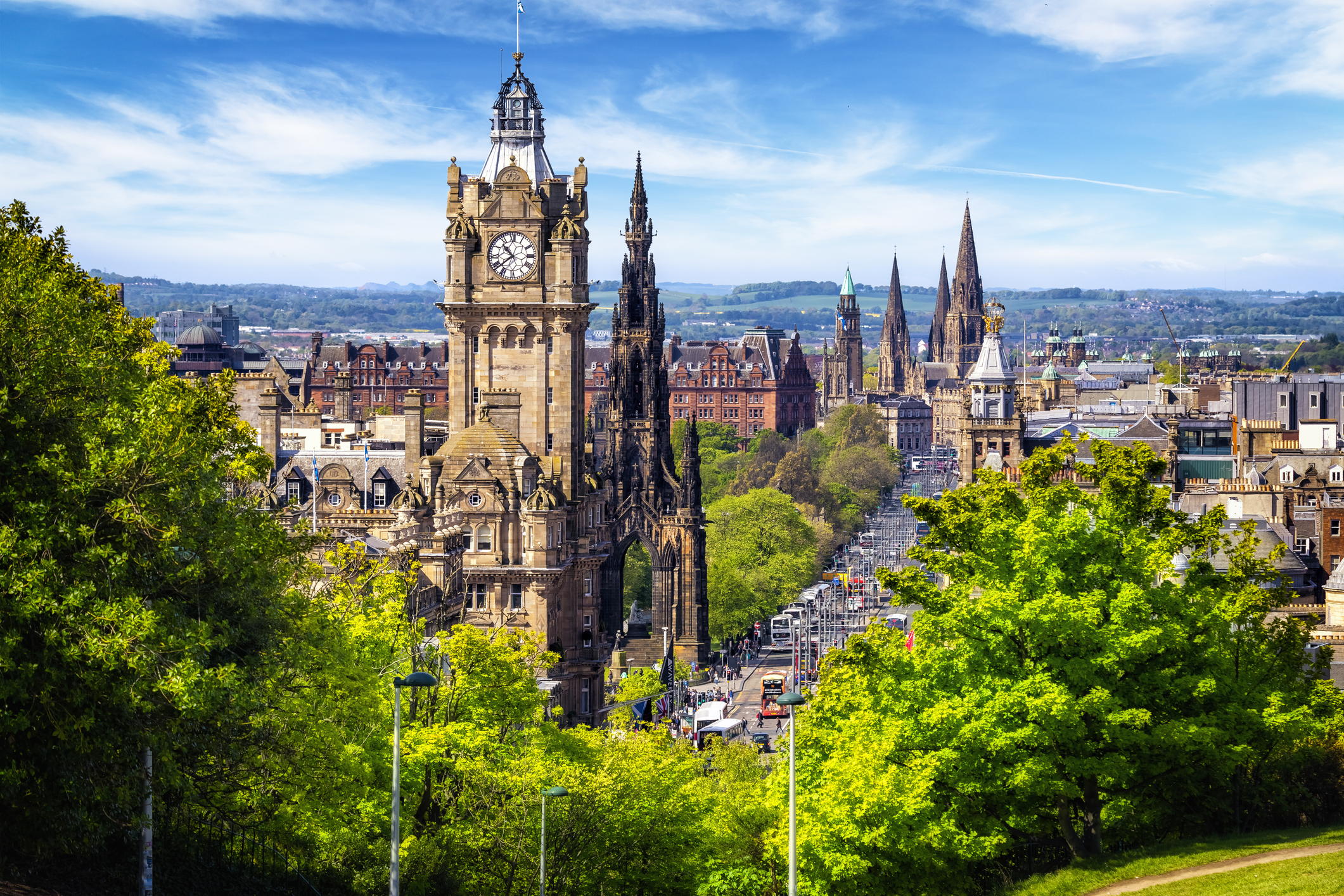 A towering clock tower overlooking a cityscape.